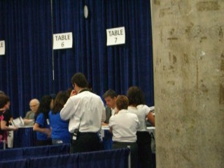 blurry picture of Craig Ferguson (in gray suit)